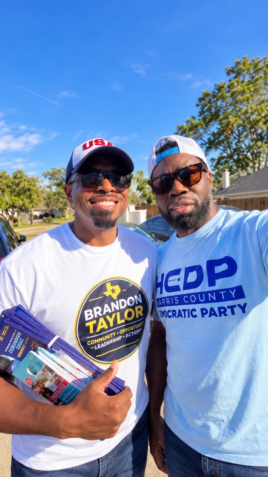 Brandon K. Taylor and SDEC Committeeman Justin Boyd during community canvassing.