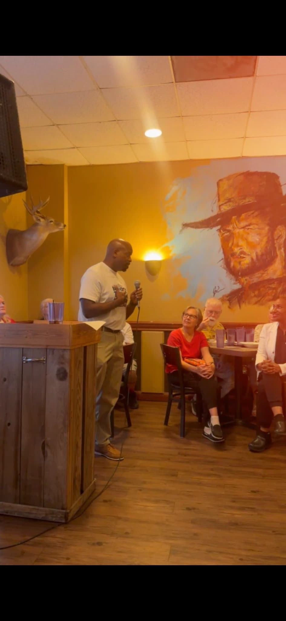 Brandon K. Taylor speaking at a community gathering