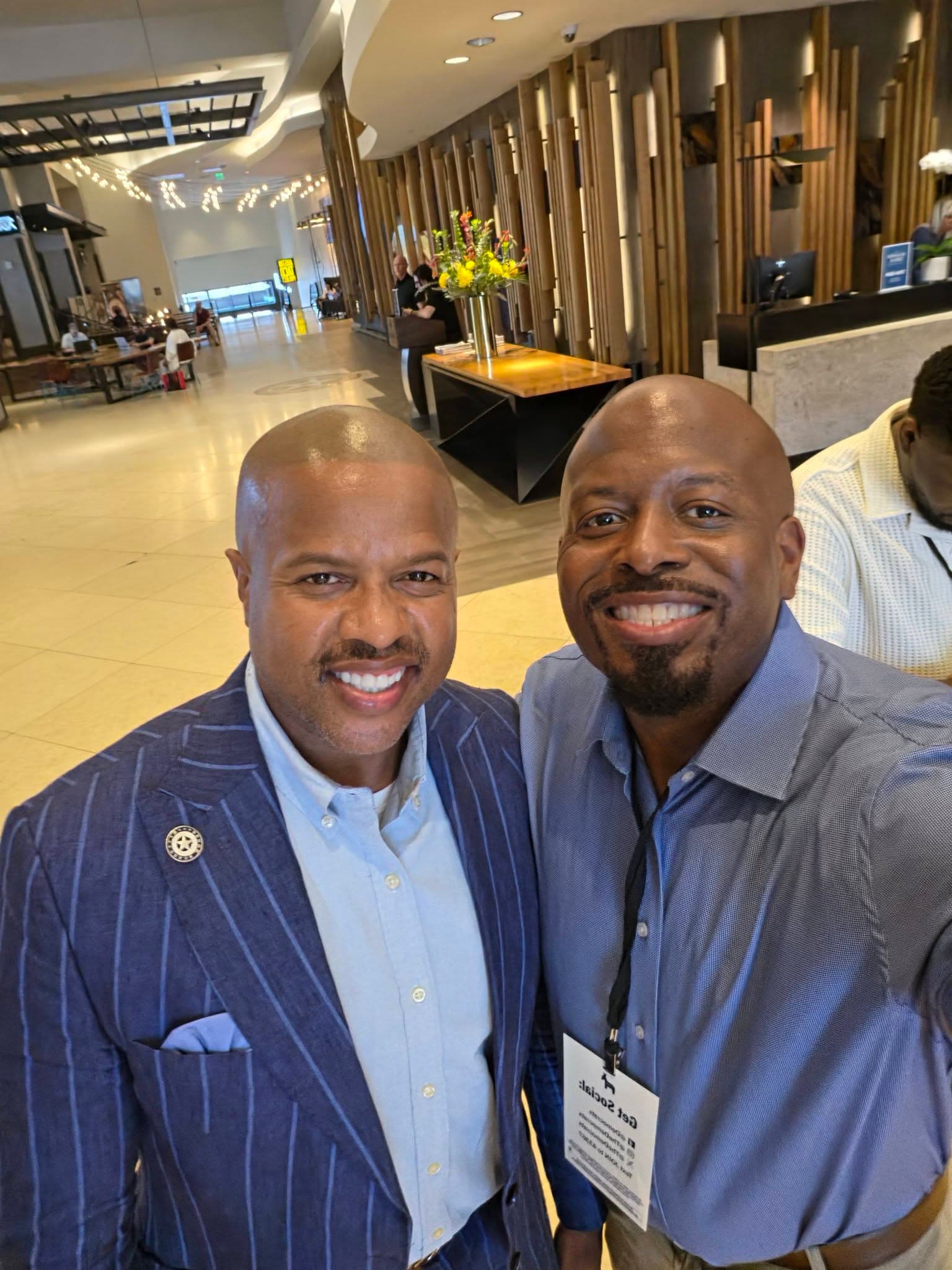 Brandon K. Taylor with another attendee during the DNC meeting