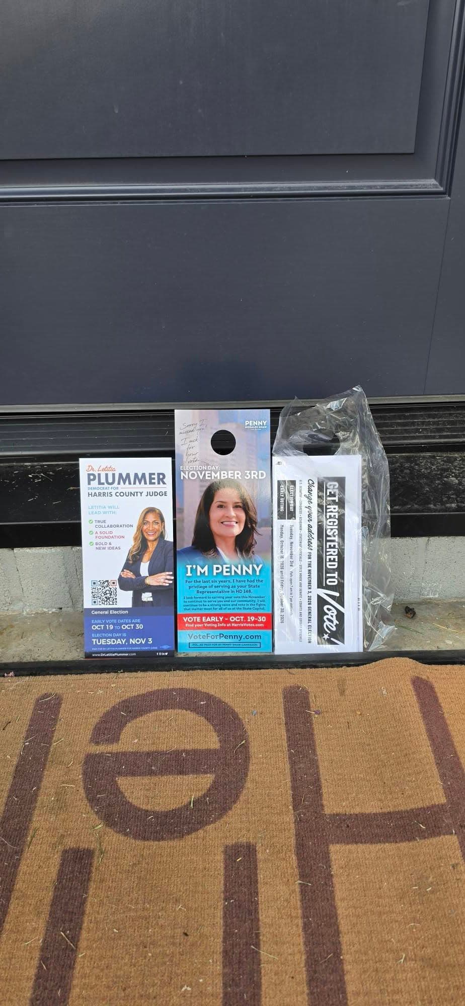 Voter outreach and campaign literature placed at a residence during the Precinct 323 canvass